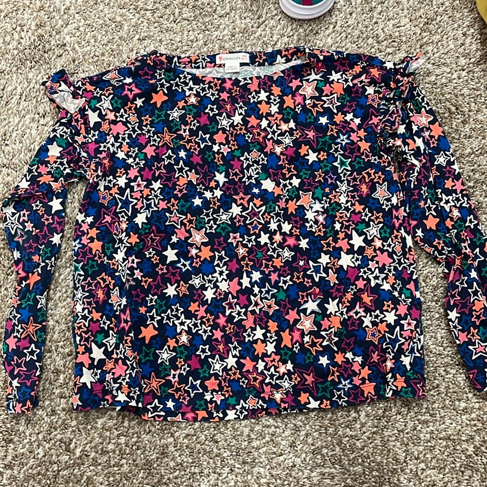 Ruffle accent on shoulder long sleeve star tee